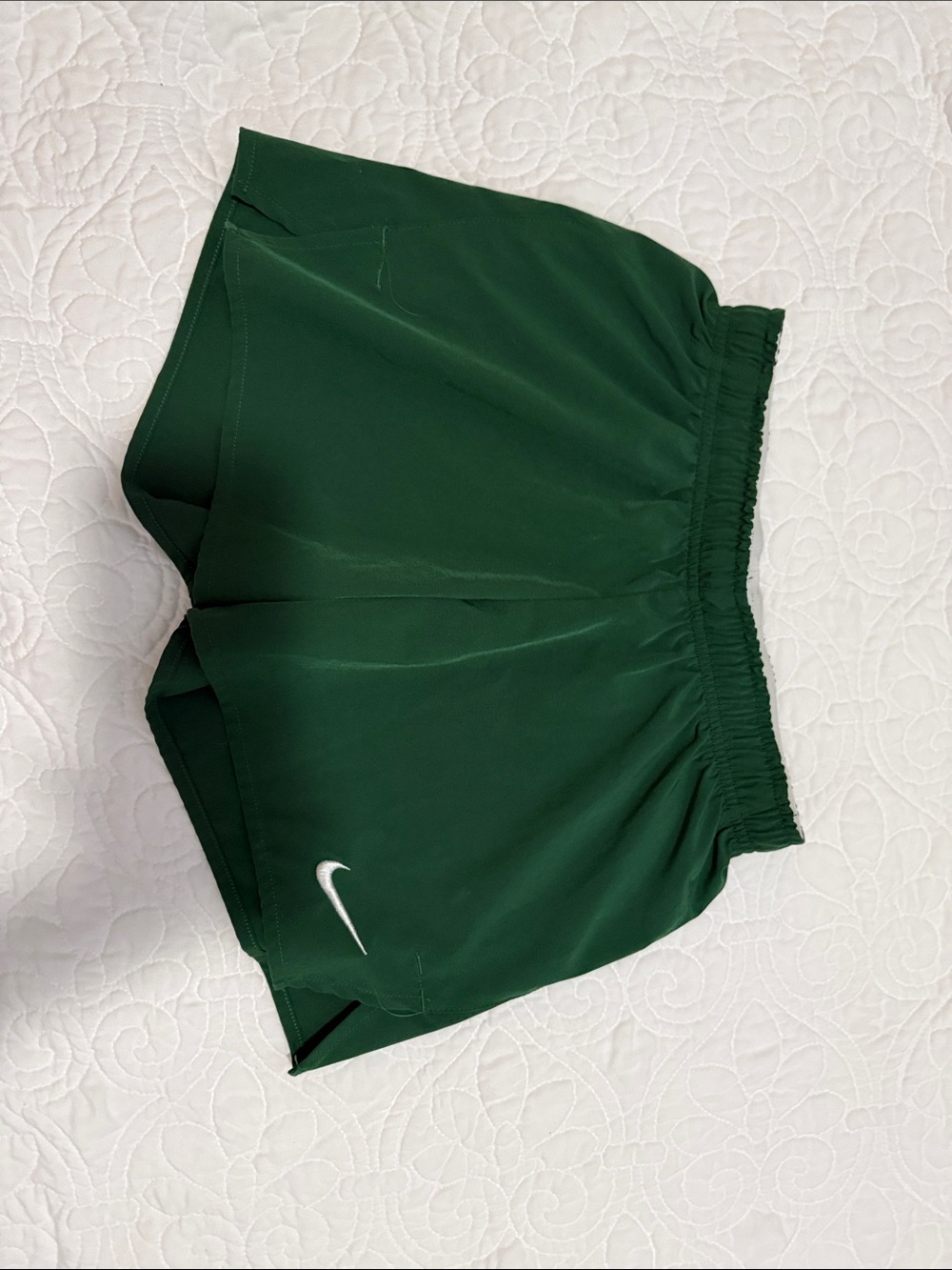 Nike Green Athletic Shorts with White Swoosh